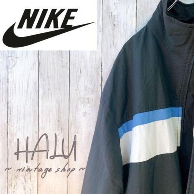 NIKE(ナイキ)のチャック破損品ナイキ NIKE ナイロンジャンパー 刺繍ロゴ 黒 シンプル メンズのジャケット/アウター(ナイロンジャケット)の商品写真