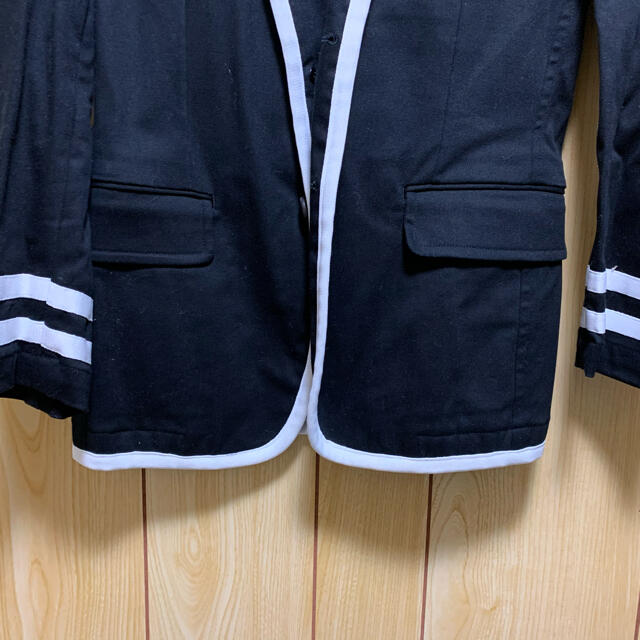 COMME des GARÇONS コムデギャルソン パイピングジャケットの COMME des GARÇONS コムデギャルソン パイピングジャケットの