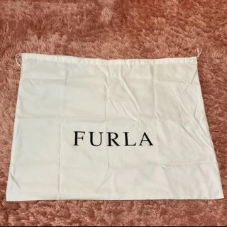 フルラ(Furla)のFURLA フルラ 保存袋　巾着　ホワイト　白　新品未使用(ショップ袋)