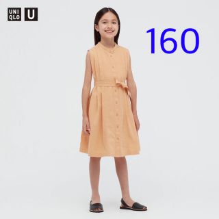 ユニクロ(UNIQLO)のユニクロ GIRLS シアサッカーワンピース 160cm／オレンジ 新品タグ付き(ワンピース)