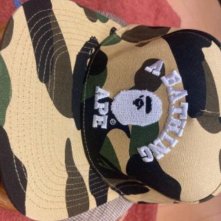 アベイシングエイプ(A BATHING APE)の【美品】A Bathing Ape 猿迷彩カレッジロゴキャップ スナップバック(キャップ)