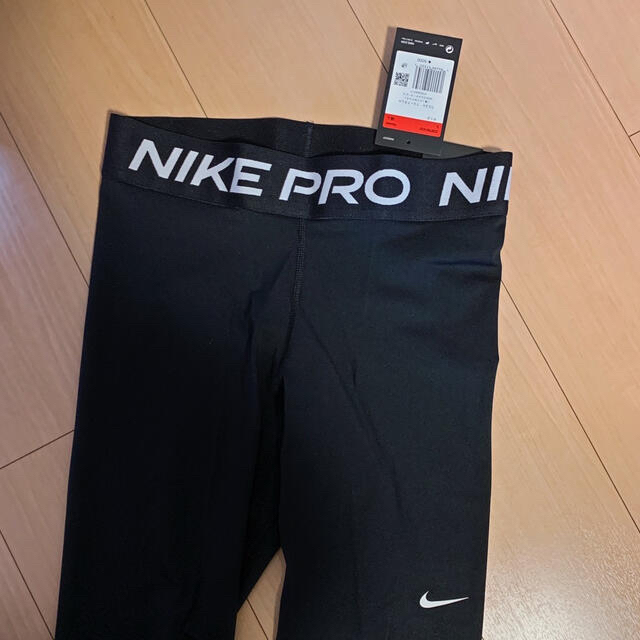 NIKE(ナイキ)の【新品】ナイキ　トレーニングパンツ　レギンス  Lサイズ レディースのレッグウェア(レギンス/スパッツ)の商品写真