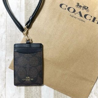 コーチ(COACH)の新品未使用 コーチ ブラウン ブラック シグネチャー カードケース IDケース(パスケース/IDカードホルダー)