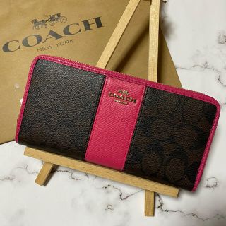 コーチ(COACH)の【COACH】コーチ長財布シグネチャー　トゥルーレッド　茶色×ピンク(赤)(財布)