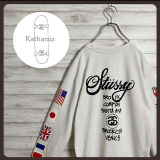 ステューシー(STUSSY)の【即完売モデル】ステューシーワールドツアー両面プリントスリーブロゴスウェット(スウェット)