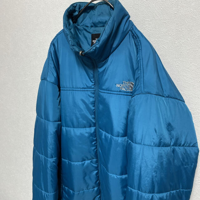 THE NORTH FACE(ザノースフェイス)の古着 ノースフェイス 中綿ジャケット メンズL ブルー メンズのジャケット/アウター(ダウンジャケット)の商品写真