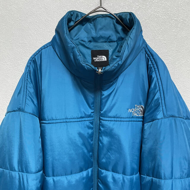 THE NORTH FACE(ザノースフェイス)の古着 ノースフェイス 中綿ジャケット メンズL ブルー メンズのジャケット/アウター(ダウンジャケット)の商品写真