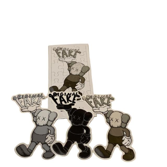 Supreme(シュプリーム)のkaws ステッカー&パズル　セット original fake エンタメ/ホビーのフィギュア(その他)の商品写真