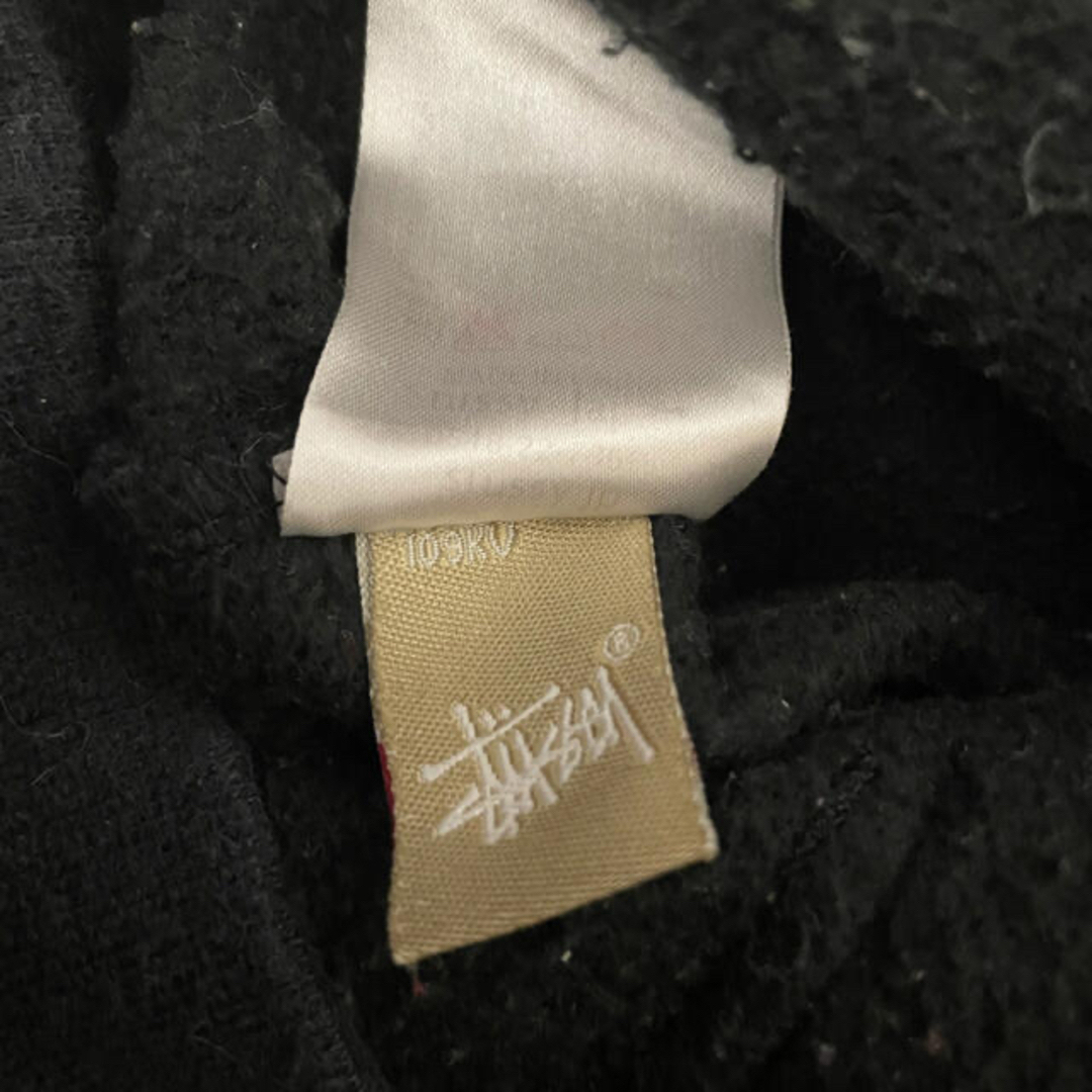 STUSSY(ステューシー)の【USA製】STUSSY 総柄　パーカー　ブラック メンズのトップス(パーカー)の商品写真