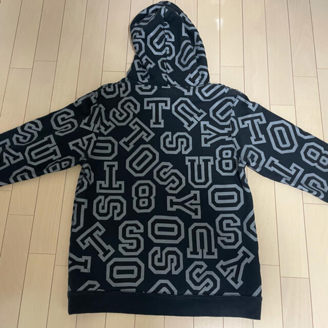 STUSSY(ステューシー)の【USA製】STUSSY 総柄　パーカー　ブラック メンズのトップス(パーカー)の商品写真