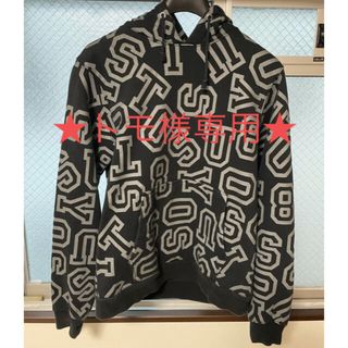 ステューシー(STUSSY)の【USA製】STUSSY 総柄　パーカー　ブラック(パーカー)