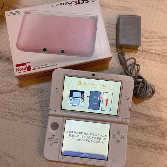 任天堂(ニンテンドウ)のNintendo 3DS  LL 本体ピンク/ホワイト＋充電器＋SDカード エンタメ/ホビーのゲームソフト/ゲーム機本体(携帯用ゲーム機本体)の商品写真