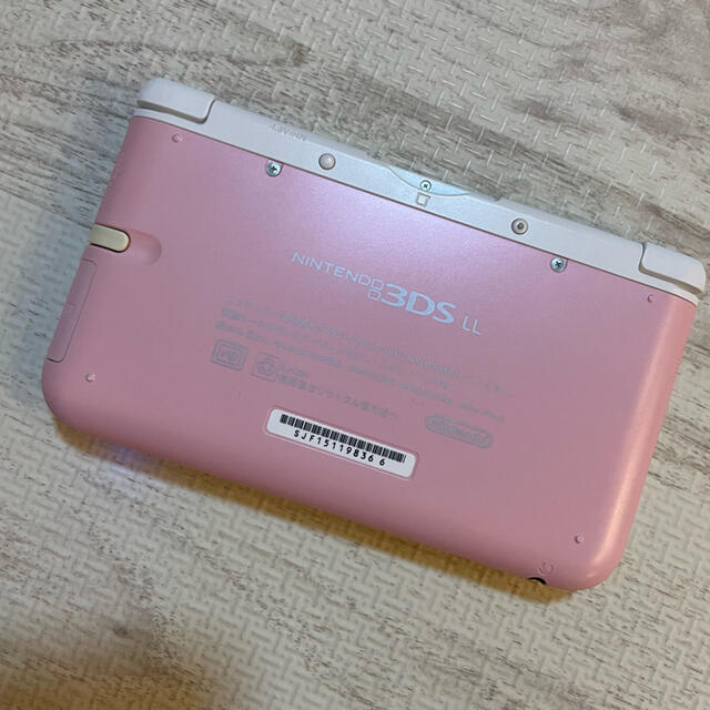 任天堂(ニンテンドウ)のNintendo 3DS  LL 本体ピンク/ホワイト＋充電器＋SDカード エンタメ/ホビーのゲームソフト/ゲーム機本体(携帯用ゲーム機本体)の商品写真