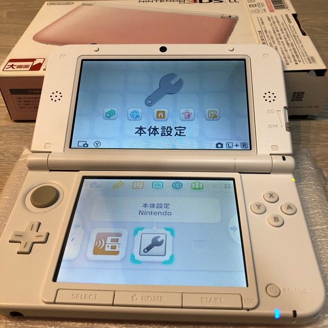 ニンテンドー3DS(ニンテンドー3DS)のNintendo 3DS  LL 本体ピンク/ホワイト エンタメ/ホビーのゲームソフト/ゲーム機本体(携帯用ゲーム機本体)の商品写真