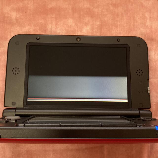 ニンテンドー3DS(ニンテンドー3DS)のニンテンドー 3DSLL(レッド×ブラック) ジャンク品 エンタメ/ホビーのゲームソフト/ゲーム機本体(携帯用ゲーム機本体)の商品写真