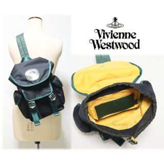 ヴィヴィアンウエストウッド(Vivienne Westwood)の新品タグ付き【 ヴィヴィアンウエストウッド】ダブルフラップ 斜めリュックサック(バッグパック/リュック)