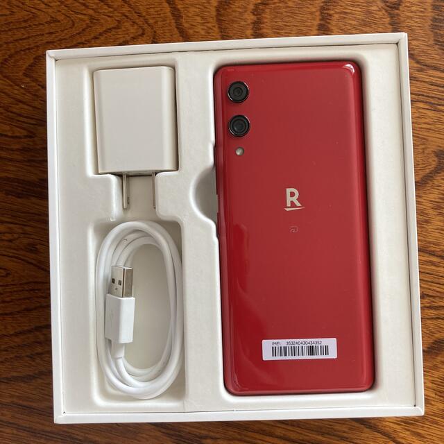 Rakuten(ラクテン)のRakuten handレッド　フィルム、ケース付 スマホ/家電/カメラのスマートフォン/携帯電話(スマートフォン本体)の商品写真