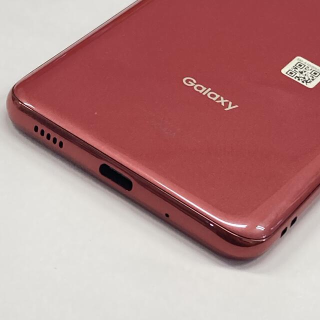 Galaxy(ギャラクシー)の中古品 docomo GALAXY A21 SC-42A レッド スマホ/家電/カメラのスマートフォン/携帯電話(スマートフォン本体)の商品写真