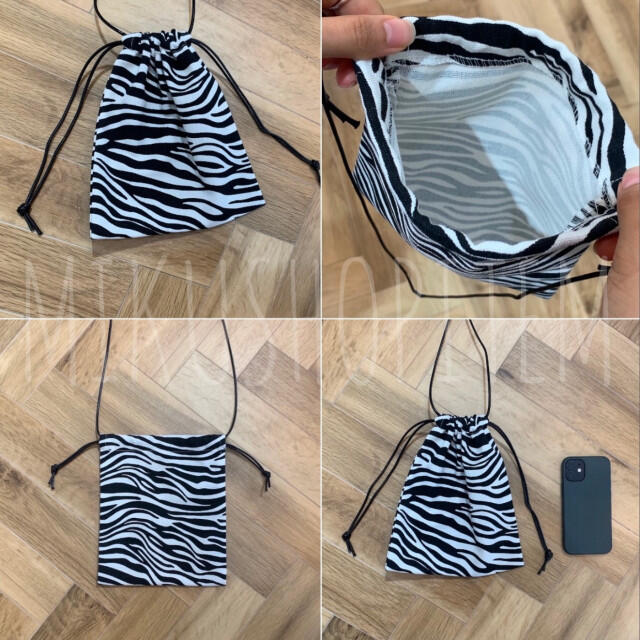 ZARA(ザラ)のゼブラ ミニ 巾着ショルダー モノトーン バッグ  アニマル 動物 レディース レディースのバッグ(ショルダーバッグ)の商品写真