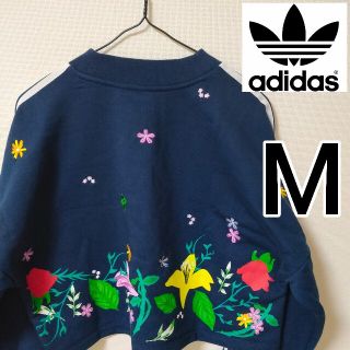 アディダス(adidas)のアディダス ネイビー 花柄 バックプリント 裏毛 スウェットトレーナー 短丈(トレーナー/スウェット)