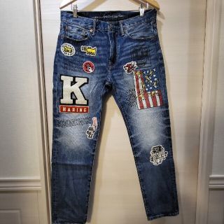 アメリカンイーグル(American Eagle)の【アメリカン・イーグル】キースヘリング コラボ デニムパンツ パッチ ワッペン(デニム/ジーンズ)