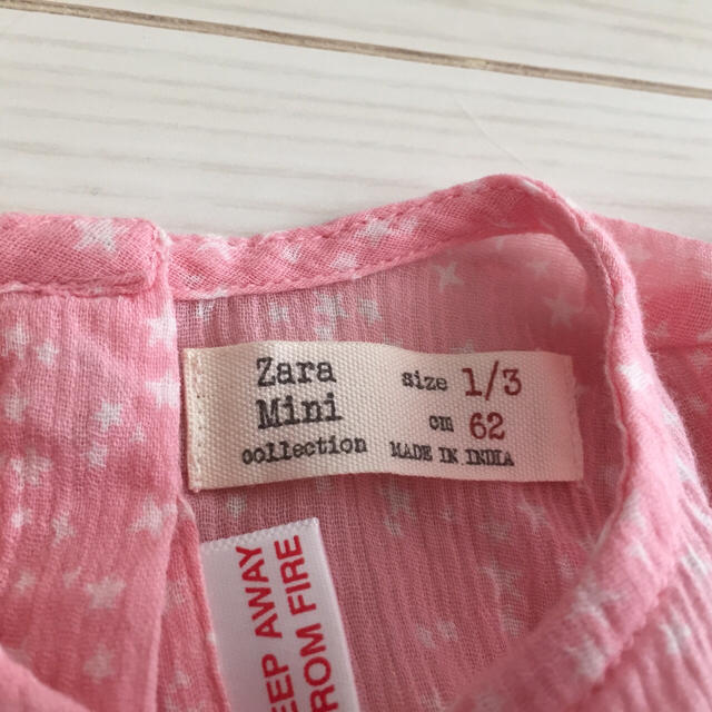 ZARA(ザラ)の【お値下げ】ザラ 星型フリルロンパース 新品 キッズ/ベビー/マタニティのベビー服(~85cm)(ロンパース)の商品写真