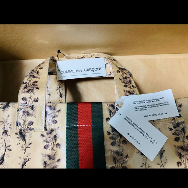 Gucci(グッチ)のCOMME DES GARCONS × GUCCI  フローラル PVC メンズのバッグ(トートバッグ)の商品写真