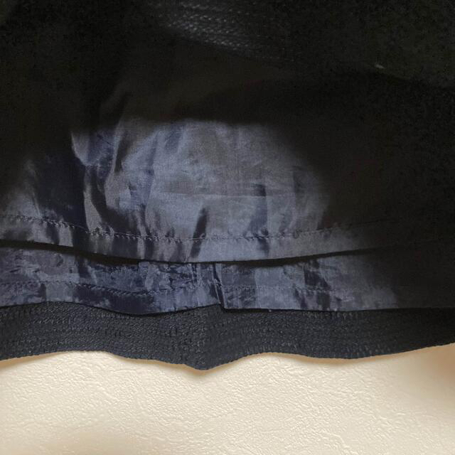 CLEAR IMPRESSION(クリアインプレッション)のCLEAR IMPRESSION 紺色　タイトスカート　パール風ビーズの飾り付き レディースのスカート(ひざ丈スカート)の商品写真