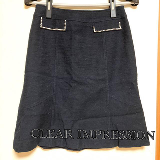 クリアインプレッション(CLEAR IMPRESSION)のCLEAR IMPRESSION 紺色　タイトスカート　パール風ビーズの飾り付き(ひざ丈スカート)