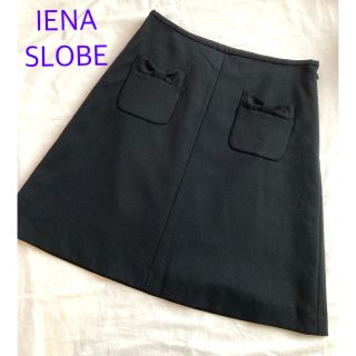 スローブイエナ(SLOBE IENA)のSLOBE IENAスローブイエナ　台形スカート  ウール　リボン　ブラック(ひざ丈スカート)