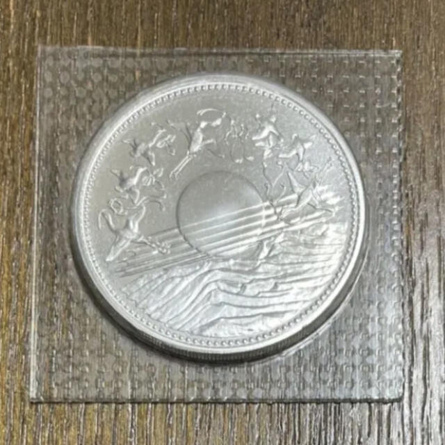 貨幣天皇陛下御在位60年記念硬貨 額面10,000円 ・1万円 1枚です。