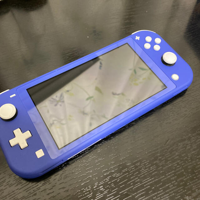 中心部分に丸い跡が付いてます【ジャンク品】Nintendo Switch LITE ブルー