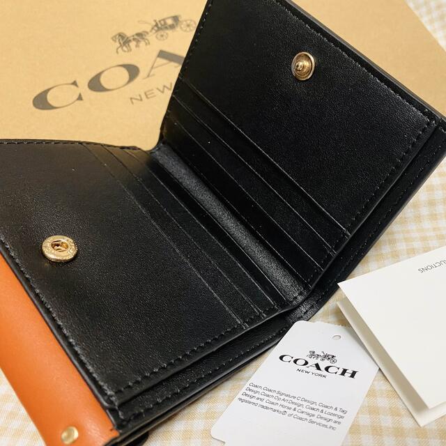 【新品】COACHI コーチ 二つ折り財布 スタッズ 馬モチーフ シグネチャー