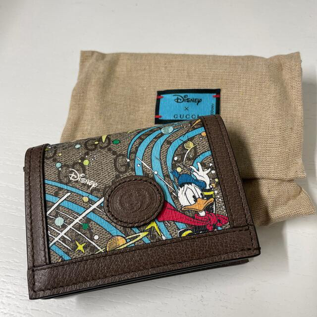 Gucci(グッチ)のGUCCI×Disney ドナルド ミニ財布 レディースのファッション小物(財布)の商品写真