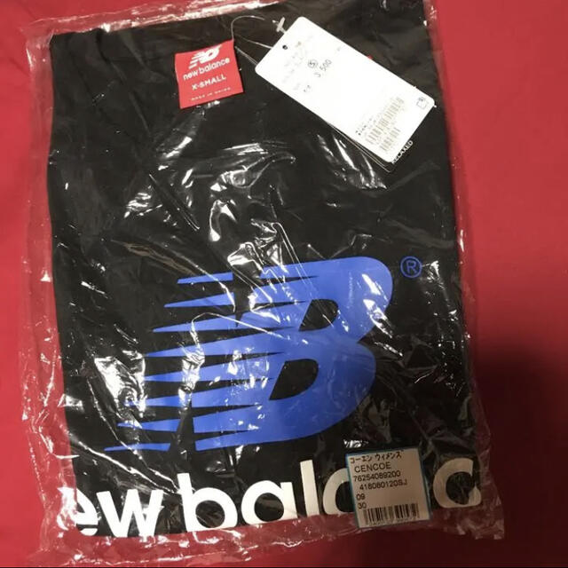 New Balance(ニューバランス)のNew Balance  コーエンのコラボTシャツ　定価税込3,890円 レディースのトップス(Tシャツ(半袖/袖なし))の商品写真