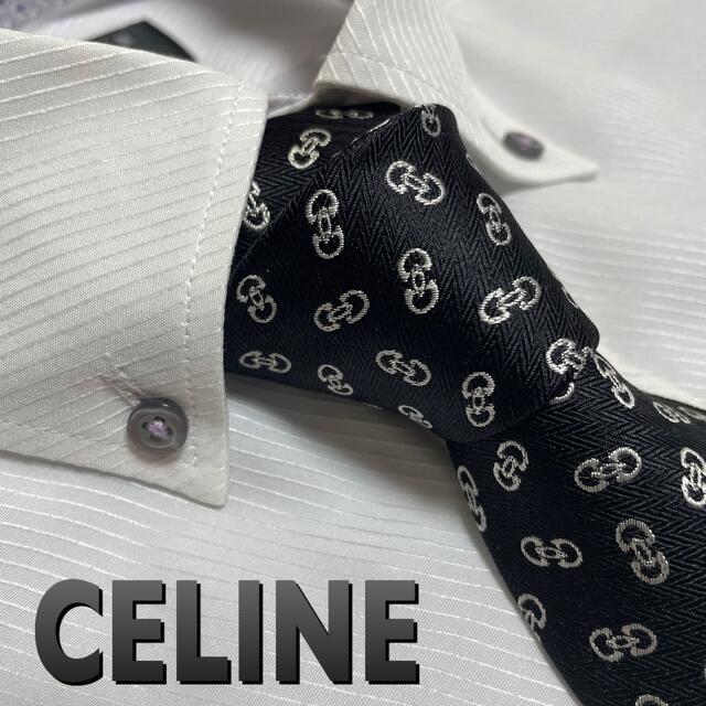 celine(セリーヌ)のセリーヌ　ネクタイ【未使用に近い】CELINE  パターン柄　厚手　黒×シルバー メンズのファッション小物(ネクタイ)の商品写真