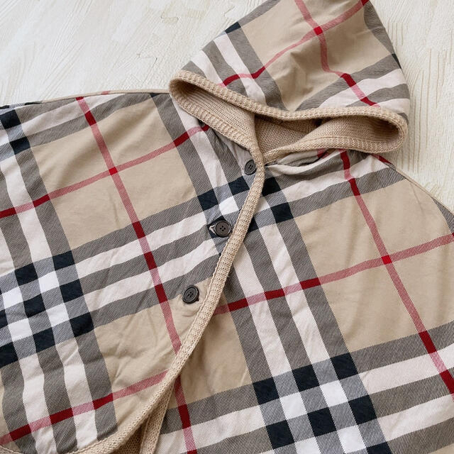 BURBERRY(バーバリー)のBURBERRY バーバリー  ポンチョ  リバーシブル キッズ/ベビー/マタニティのベビー服(~85cm)(カーディガン/ボレロ)の商品写真