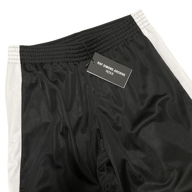 RAF SIMONS - 新品 ラフシモンズ ARCHIVE REDUX トラックパンツ RAF SIMONS - 新品 ラフシモンズ ARCHIVE REDUX トラックパンツ