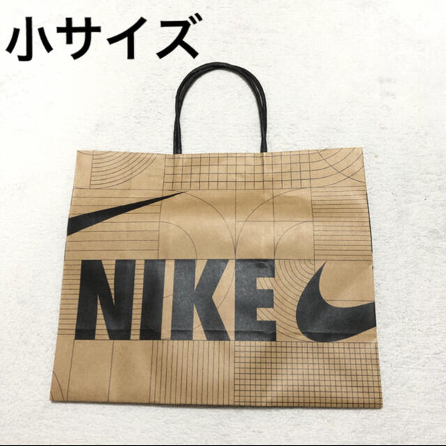 NIKE(ナイキ)の小サイズ 紙袋　NIKE ナイキ ショッパー　ナイキ紙袋　プレゼント梱包資材 レディースのバッグ(ショップ袋)の商品写真