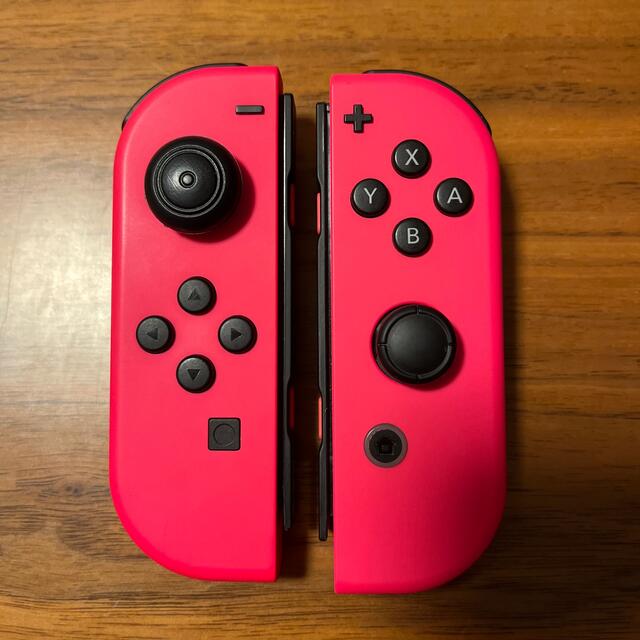 Nintendo Switch(ニンテンドースイッチ)のばべる様　ジャンク品　ジョイコン　左右　ネオンピンク エンタメ/ホビーのゲームソフト/ゲーム機本体(家庭用ゲーム機本体)の商品写真