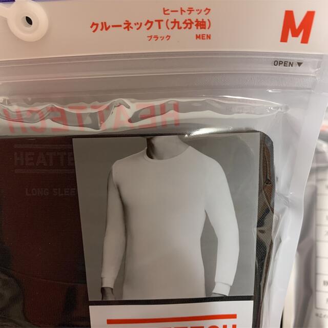 UNIQLO(ユニクロ)のユニクロ　ヒートテッククルーネックT（九分袖）サイズM カラー黒　2袋セット メンズのアンダーウェア(その他)の商品写真