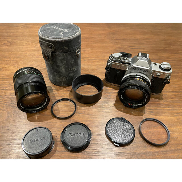 Canon(キヤノン)の【キャノン　Canon AE-1  本体・レンズ２本セット】 スマホ/家電/カメラのカメラ(フィルムカメラ)の商品写真