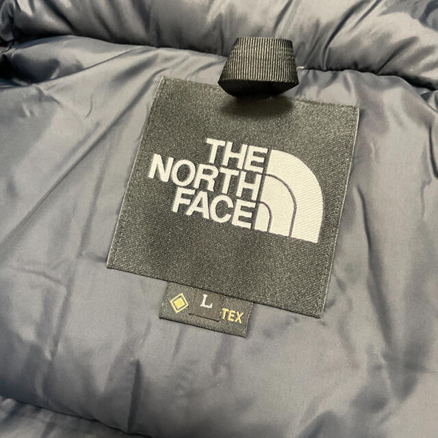 THE NORTH FACE(ザノースフェイス)の【新品未使用】THE NORTH FACE マウンテンダウンジャケットLサイズ メンズのジャケット/アウター(ダウンジャケット)の商品写真