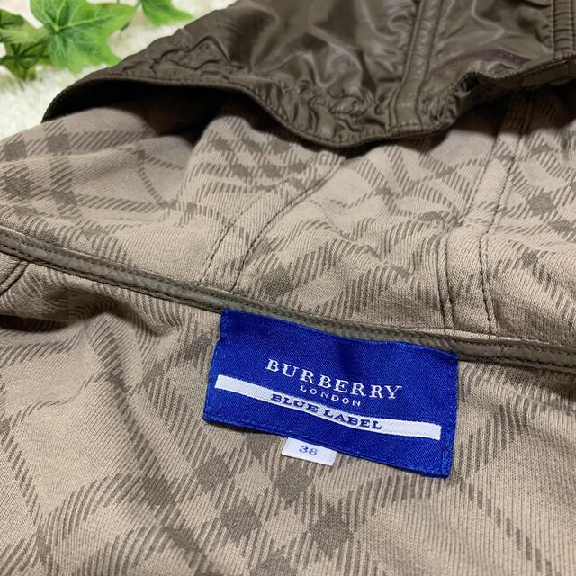 BURBERRY BLUE LABEL(バーバリーブルーレーベル)のバーバリーブルーレーベル フード付きベスト 38 カーキ 裏地チェック レディースのジャケット/アウター(その他)の商品写真