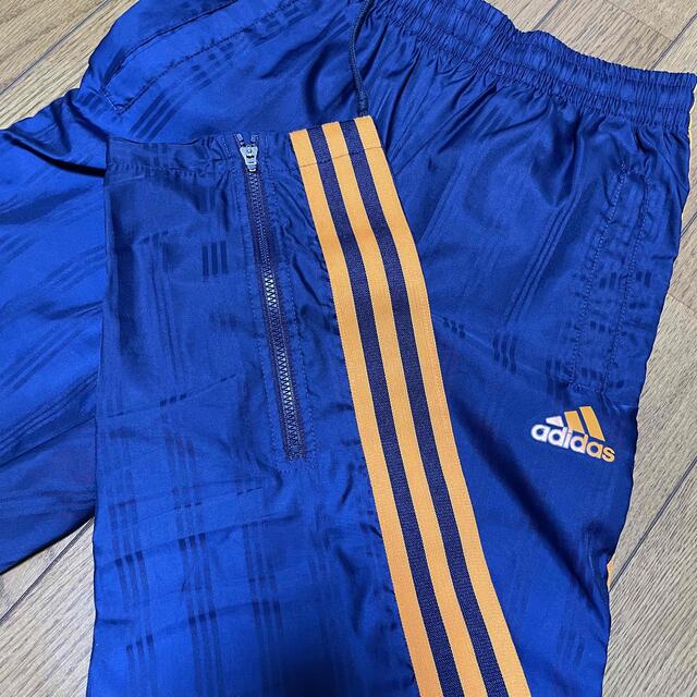 adidas(アディダス)の140cmアディダスパンツ・長ズボン・ブルーオレンジ裾チャック キッズ/ベビー/マタニティのキッズ服男の子用(90cm~)(パンツ/スパッツ)の商品写真