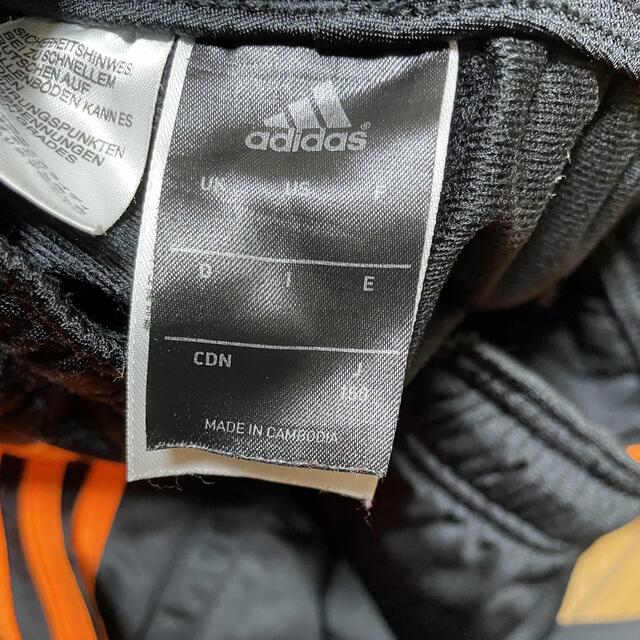 adidas(アディダス)のadidas150cmジャージセットアップ黒・オレンジパンツ・ズボン キッズ/ベビー/マタニティのキッズ服男の子用(90cm~)(パンツ/スパッツ)の商品写真