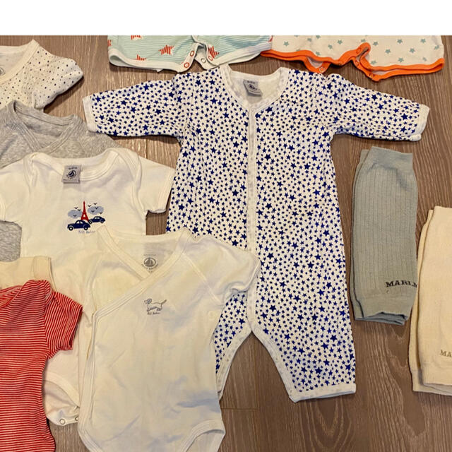 PETIT BATEAU(プチバトー)のプチバトー　長袖ロンパース（ブルーの星柄） キッズ/ベビー/マタニティのベビー服(~85cm)(ロンパース)の商品写真