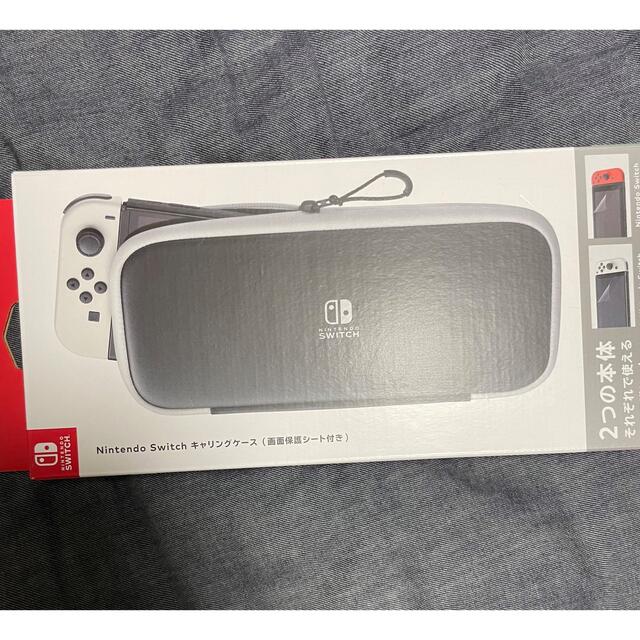 Nintendo Switch(ニンテンドースイッチ)のNintendo Switch  有機ELモデル　ホワイト　ケースセット エンタメ/ホビーのゲームソフト/ゲーム機本体(携帯用ゲーム機本体)の商品写真