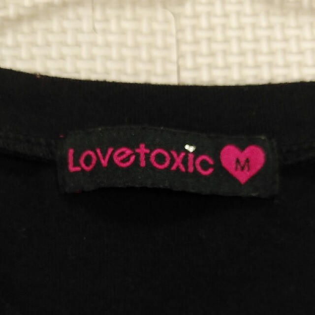 lovetoxic(ラブトキシック)のラブトキシック　長袖　ロンTシャツ  140～150　黒　ヒール柄 キッズ/ベビー/マタニティのキッズ服女の子用(90cm~)(Tシャツ/カットソー)の商品写真