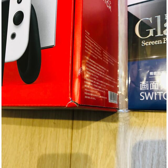 Nintendo Switch(ニンテンドースイッチ)の新品未開封 ニンテンドースイッチ 有機ELモデル 画面保護ガラスフィルム付き エンタメ/ホビーのゲームソフト/ゲーム機本体(携帯用ゲーム機本体)の商品写真